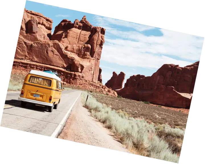 Yellow van on a desert road
